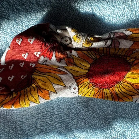 Newborn Posh Peanut Sunflower Footie - Picture 3 of 6